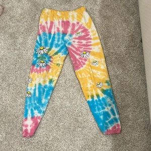 ZUMIEZ SAMII RYAN TYE DYE SWEATPANTS W/ FLOWERS.